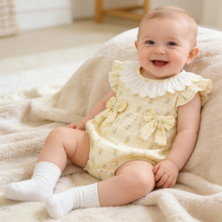 イエローフラワーロンパース　59cm～90cm