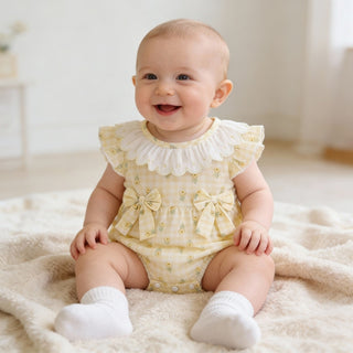 イエローフラワーロンパース　59cm～90cm